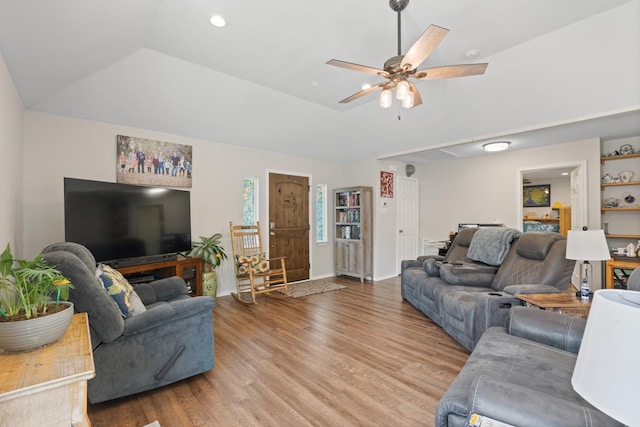 2521 Trail Tree Ct, Burleson, TX 76028 - living area featuring wood finished floors, ceiling fan, vaulted ceiling, baseboards, and recessed lighting