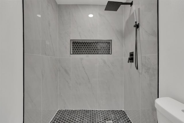 4608 Willow Elm Ct, Arlington, TX 76017 - bathroom featuring a tile shower and toilet