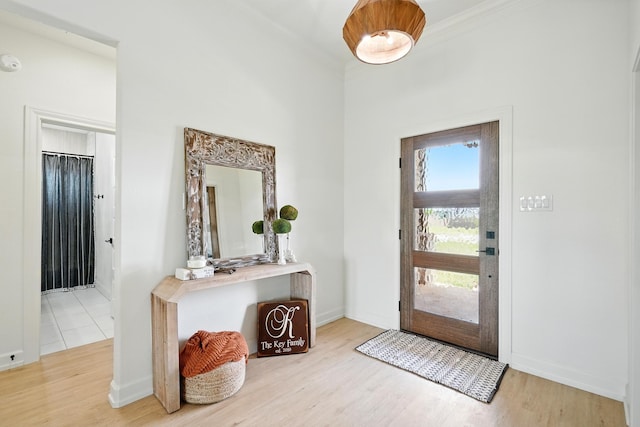 120 Crosswind Trl, Ovalo, TX 79541 - entrance foyer with wood finished floors, ornamental molding, and baseboards