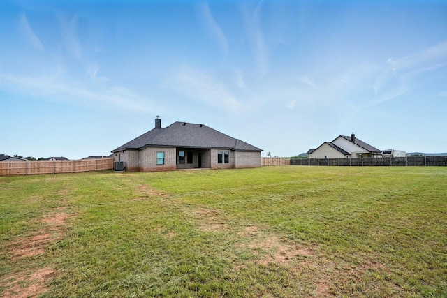 120 Crosswind Trl, Ovalo, TX 79541 - back of house featuring a chimney and cooling unit