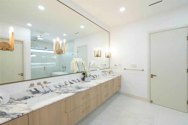4435 Merrell Rd, Dallas, TX 75229 - bathroom featuring double vanity, a shower stall, recessed lighting, and tile patterned flooring