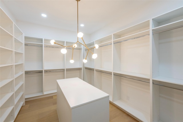4435 Merrell Rd, Dallas, TX 75229 - walk in closet featuring light wood finished floors