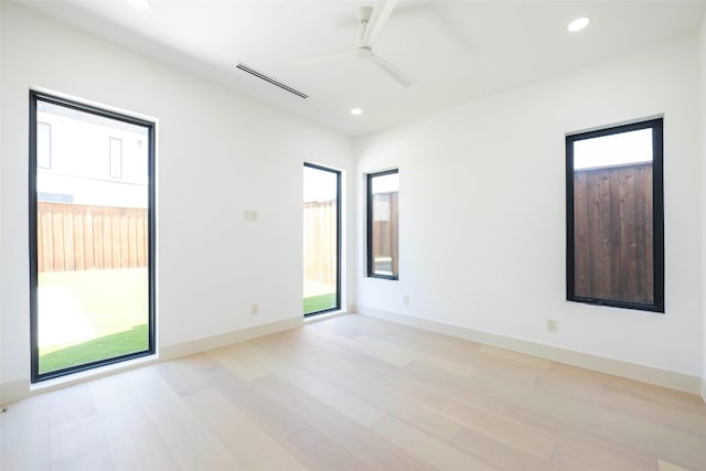 4435 Merrell Rd, Dallas, TX 75229 - unfurnished room with ceiling fan, light wood-style flooring, and recessed lighting