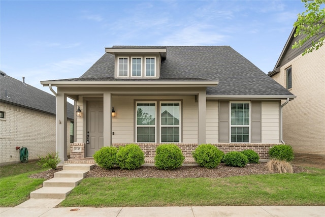 2545 Stella Ln, Northlake, TX 76247 - bungalow with a shingled roof, a porch, and brick siding