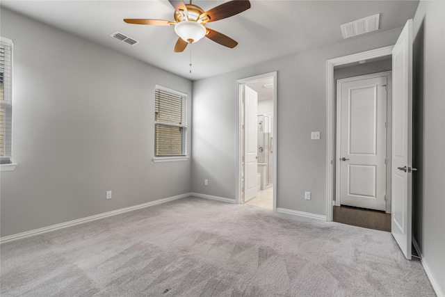 2545 Stella Ln, Northlake, TX 76247 - unfurnished bedroom featuring carpet floors, baseboards, ceiling fan, and ensuite bathroom