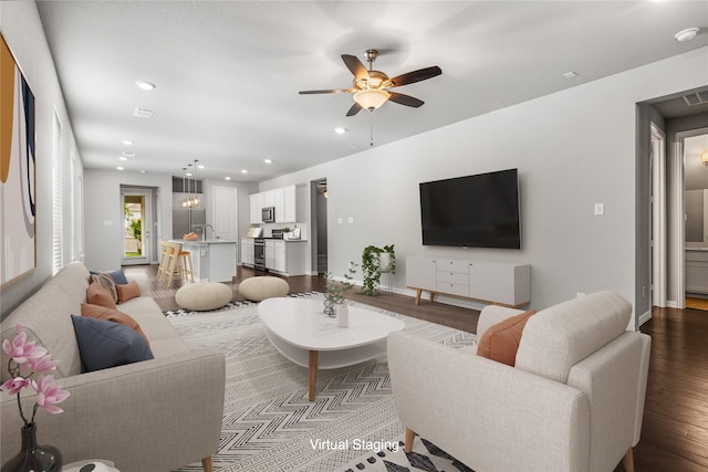 2545 Stella Ln, Northlake, TX 76247 - living room with wood finished floors, a ceiling fan, recessed lighting, and baseboards