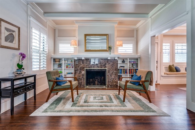 5206 Victor St, Dallas, TX 75214 - sitting room featuring ornamental molding, a high end fireplace, wood finished floors, and beam ceiling