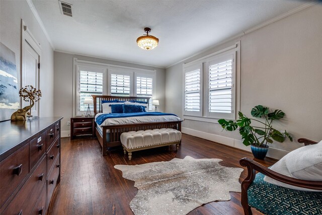 5206 Victor St, Dallas, TX 75214 - bedroom with baseboards, dark wood-style flooring, and ornamental molding