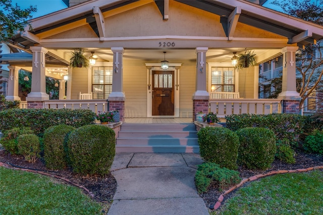 5206 Victor St, Dallas, TX 75214 - property entrance featuring covered porch and brick siding