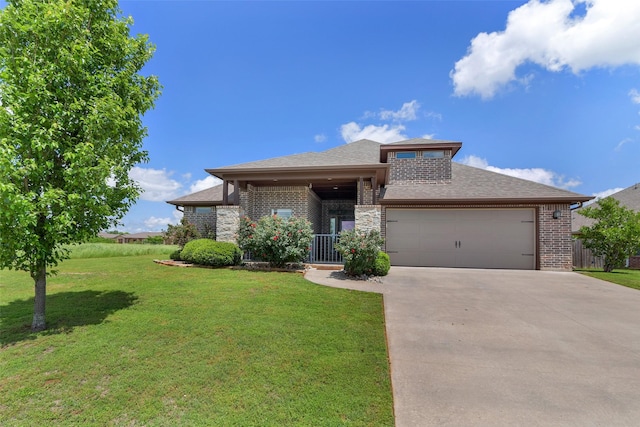 view of front of house with a garage, driveway, brick siding, and a shingled roof