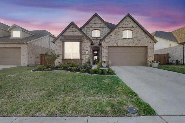 1033 Falls Rush Way, Royse City, TX 75189 - french country inspired facade featuring driveway and brick siding