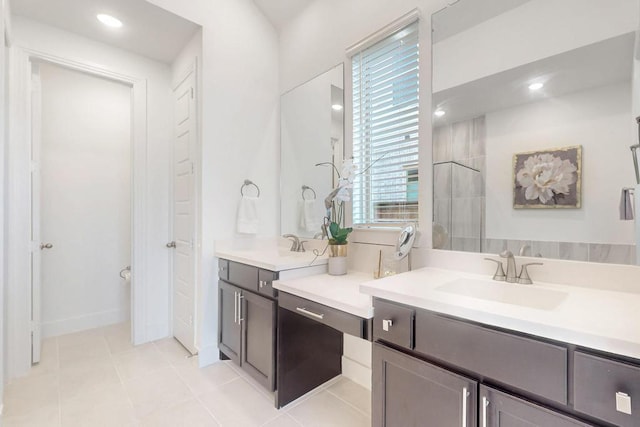 1033 Falls Rush Way, Royse City, TX 75189 - full bath featuring plenty of natural light, tile patterned flooring, a tile shower, two vanities, and recessed lighting