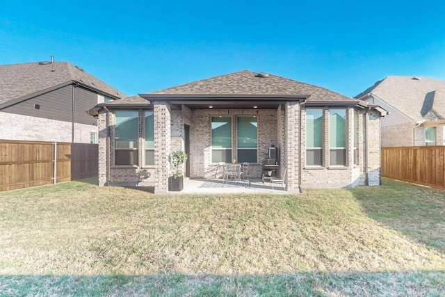 1033 Falls Rush Way, Royse City, TX 75189 - rear view of house with brick siding, a patio area, and a shingled roof