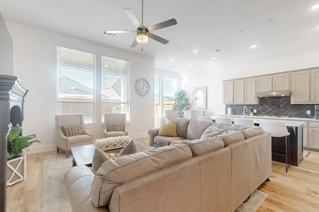 1033 Falls Rush Way, Royse City, TX 75189 - living room with ceiling fan, light wood-style floors, recessed lighting, and baseboards