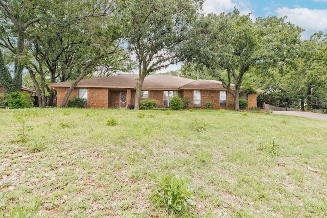1300 Woodland Trail Dr, Bowie, TX 76230 - single story home with brick siding