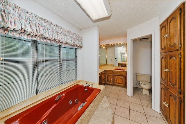 1300 Woodland Trail Dr, Bowie, TX 76230 - full bathroom with tile patterned floors, toilet, a tub with jets, vanity, and a textured ceiling