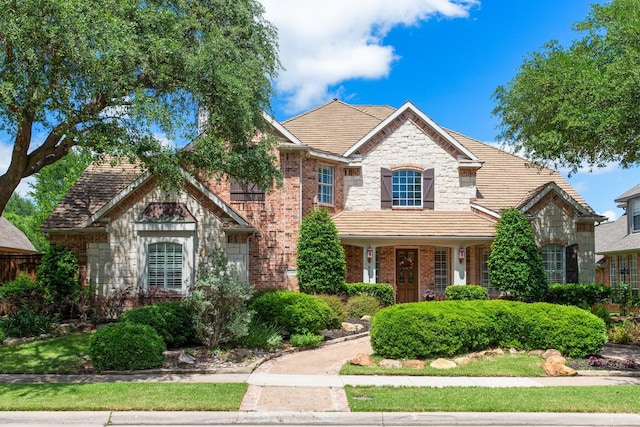 2048 Remington Ln, Frisco, TX 75033 - view of front facade with stone siding and brick siding