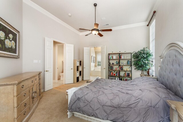 2048 Remington Ln, Frisco, TX 75033 - bedroom with light carpet, ensuite bathroom, and ornamental molding