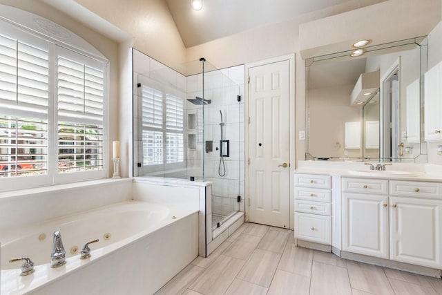 2048 Remington Ln, Frisco, TX 75033 - full bath featuring a stall shower, a whirlpool tub, vanity, and vaulted ceiling