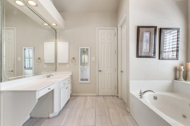 2048 Remington Ln, Frisco, TX 75033 - bathroom with a garden tub and vanity