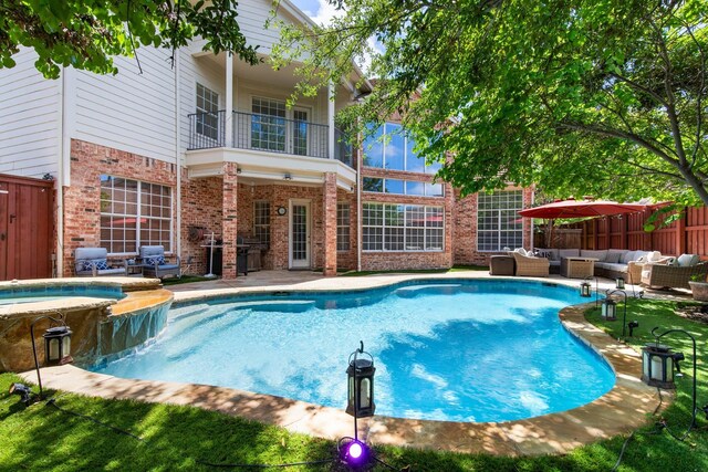 2048 Remington Ln, Frisco, TX 75033 - view of pool with outdoor lounge area, a patio area, a pool with connected hot tub, and fence