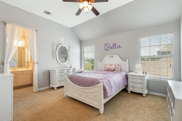 2048 Remington Ln, Frisco, TX 75033 - bedroom featuring light carpet, baseboards, lofted ceiling, ensuite bathroom, and a ceiling fan