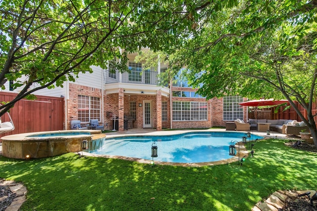 2048 Remington Ln, Frisco, TX 75033 - view of swimming pool featuring an outdoor living space, a pool with connected hot tub, and a patio area