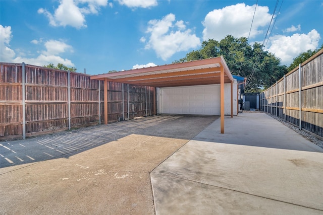 1301 Windy Meadow Dr, Plano, TX 75023 - garage featuring fence and a detached garage