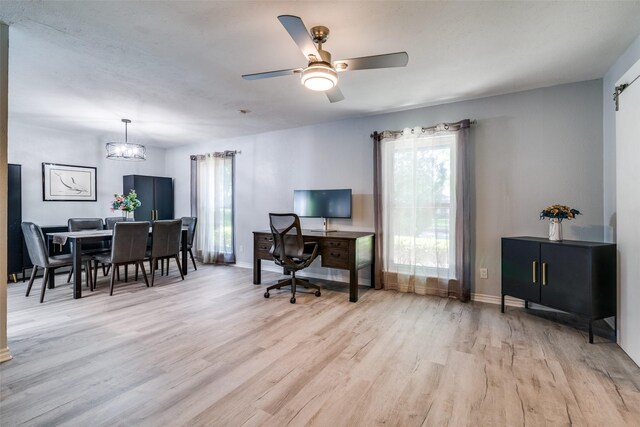 1301 Windy Meadow Dr, Plano, TX 75023 - home office featuring light wood finished floors, baseboards, a chandelier, and ceiling fan