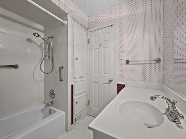 full bathroom featuring shower / tub combination and vanity