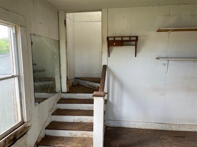 stairway with concrete floors