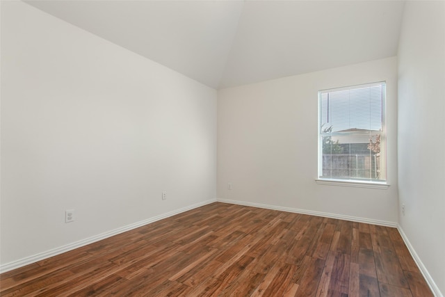 1727 Preston On The Lake Blvd, Little Elm, TX 75068 - spare room featuring wood finished floors, baseboards, and lofted ceiling