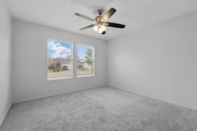 3110 Legend Dr, Mckinney, TX 75070 - empty room featuring a textured ceiling, carpet floors, ceiling fan, and baseboards