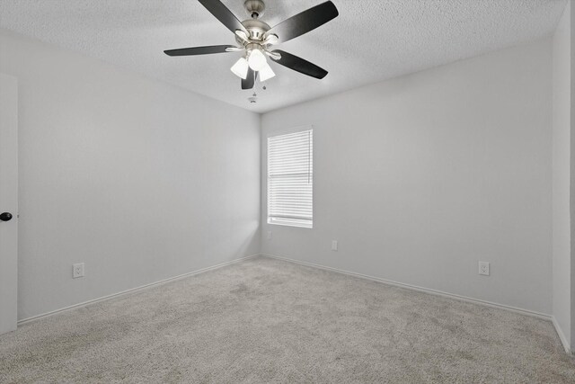 3110 Legend Dr, Mckinney, TX 75070 - carpeted spare room featuring a textured ceiling, a ceiling fan, and baseboards