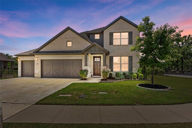216 Shadow Creek Ln, Hickory Creek, TX 75065 - view of front of property with concrete driveway, a front lawn, brick siding, and a garage