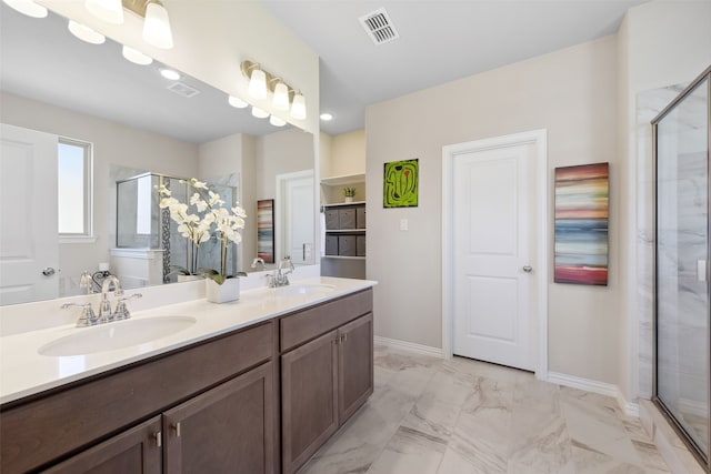 216 Shadow Creek Ln, Hickory Creek, TX 75065 - full bath with a shower stall, double vanity, marble look tile flooring, and baseboards