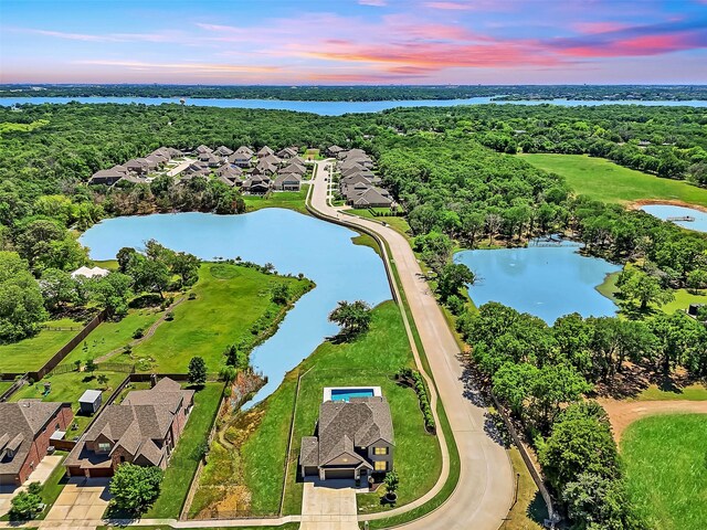 216 Shadow Creek Ln, Hickory Creek, TX 75065 - aerial perspective of suburban area featuring a large body of water