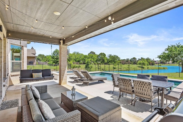 216 Shadow Creek Ln, Hickory Creek, TX 75065 - view of patio / terrace with outdoor lounge area, a water view, a fenced backyard, outdoor dining space, and view of wooded area