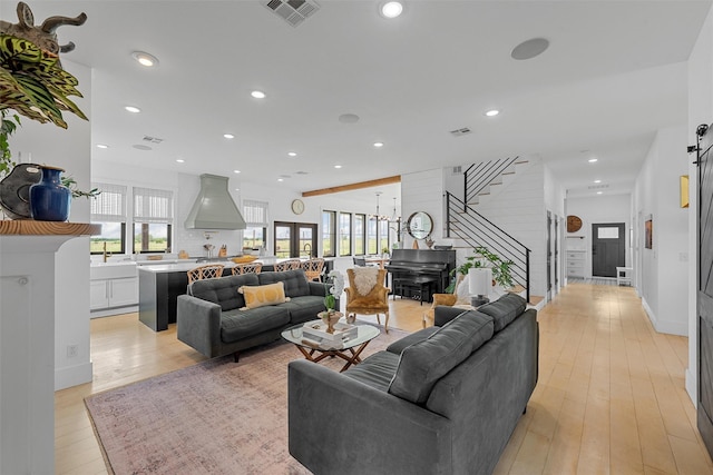 1197 Prairie Chapel Rd, Crawford, TX 76638 - living area featuring plenty of natural light, light wood-style floors, and recessed lighting