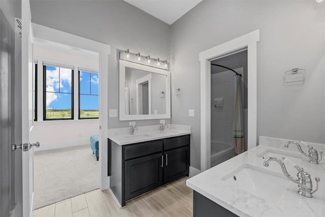 1197 Prairie Chapel Rd, Crawford, TX 76638 - bathroom with double vanity and wood finished floors