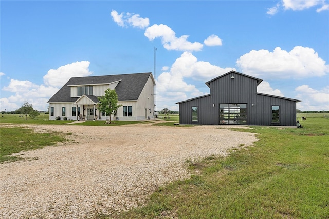 1197 Prairie Chapel Rd, Crawford, TX 76638 - view of pole building featuring driveway and a yard
