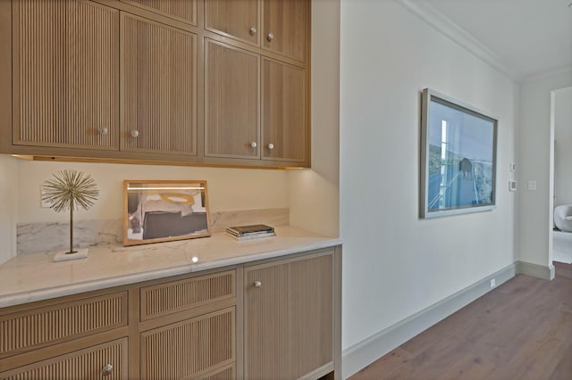 3626 University Blvd, University Park, TX 75205 - bar with wood finished floors, baseboards, and ornamental molding