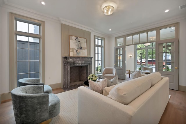 3626 University Blvd, University Park, TX 75205 - living area featuring crown molding, a fireplace, recessed lighting, light wood-style flooring, and baseboards