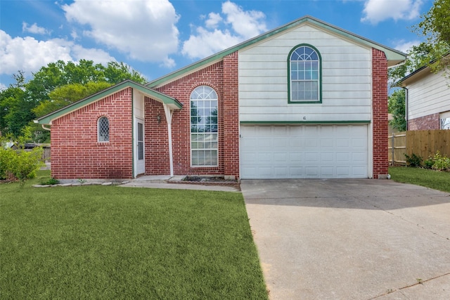 view of front of home featuring driveway, an attached garage, and brick siding
