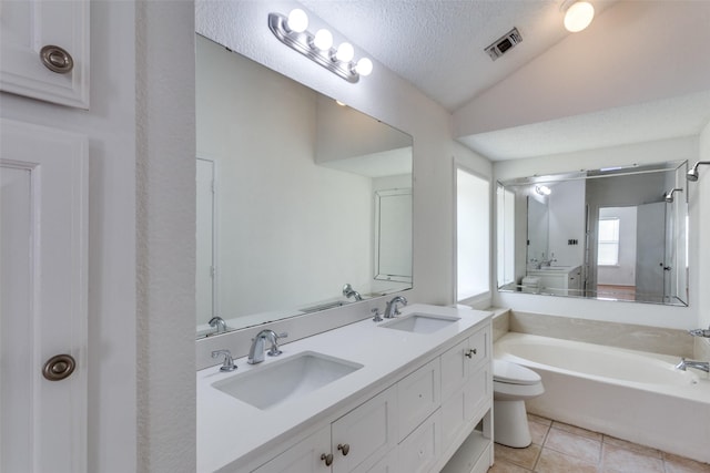 bathroom with lofted ceiling, a bath, toilet, a textured ceiling, and tile patterned floors