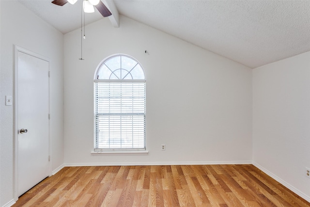 unfurnished room with healthy amount of natural light, light wood-style floors, ceiling fan, and baseboards