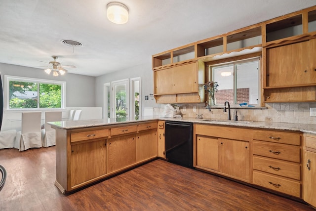 kitchen with dishwasher, a sink, open shelves, a peninsula, and tasteful backsplash