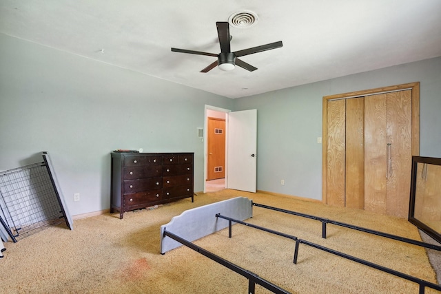 bedroom featuring carpet, baseboards, and ceiling fan