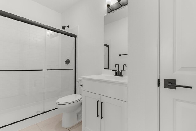 742 Faith Bud Ln, Lavon, TX 75166 - full bathroom with a stall shower, toilet, vanity, and tile patterned floors