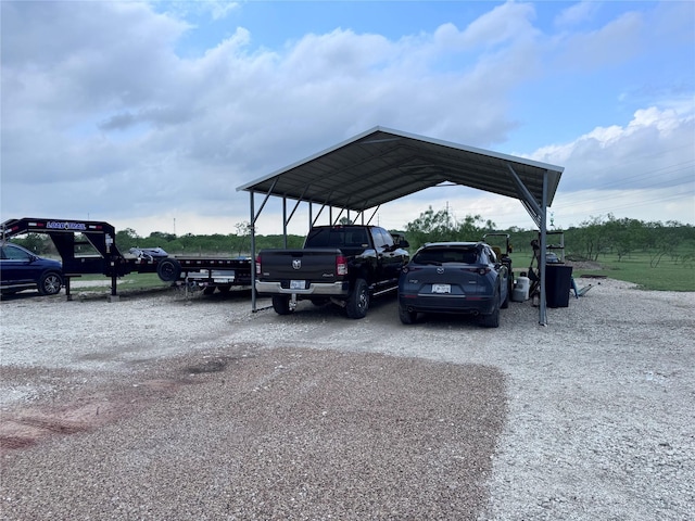 235 Hcr 2128, Whitney, TX 76692 - view of vehicle parking featuring gravel driveway and a carport